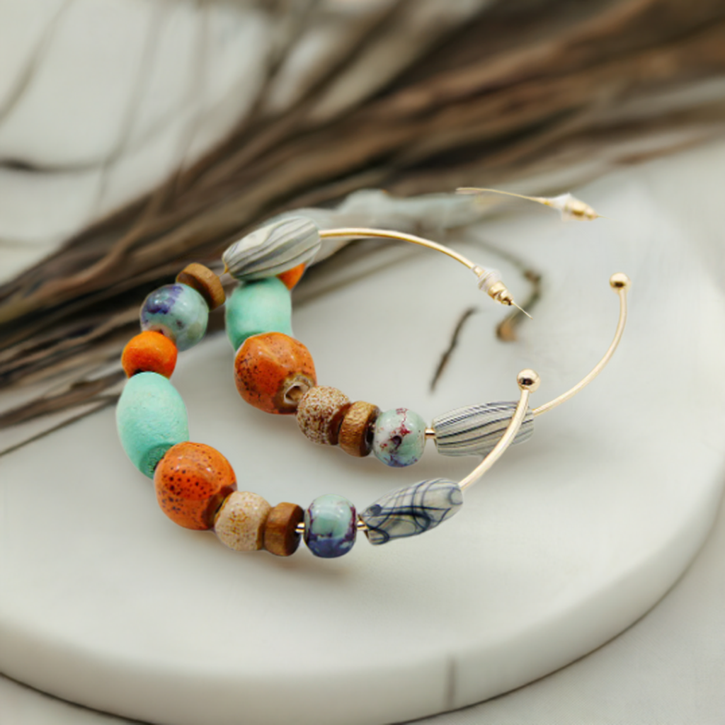 bead earrings on marble stand
