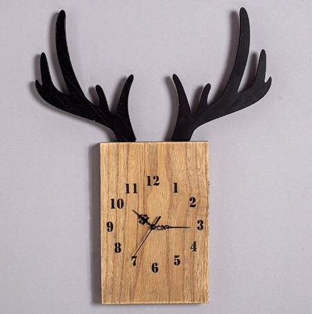 antler clock purple background