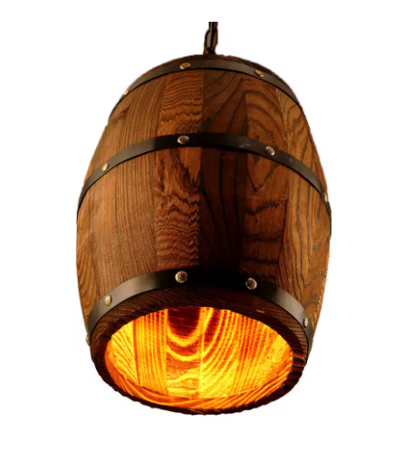 Wooden barrel-shaped pendant light with a warm glow on a white background