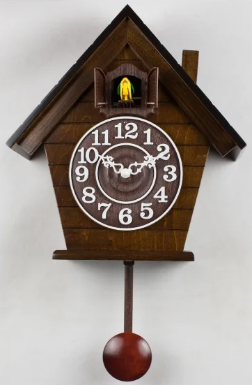 brown wood cuckoo clock with numbers