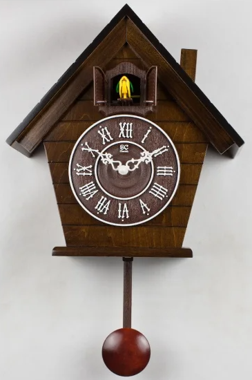 brown wooden cuckoo clock