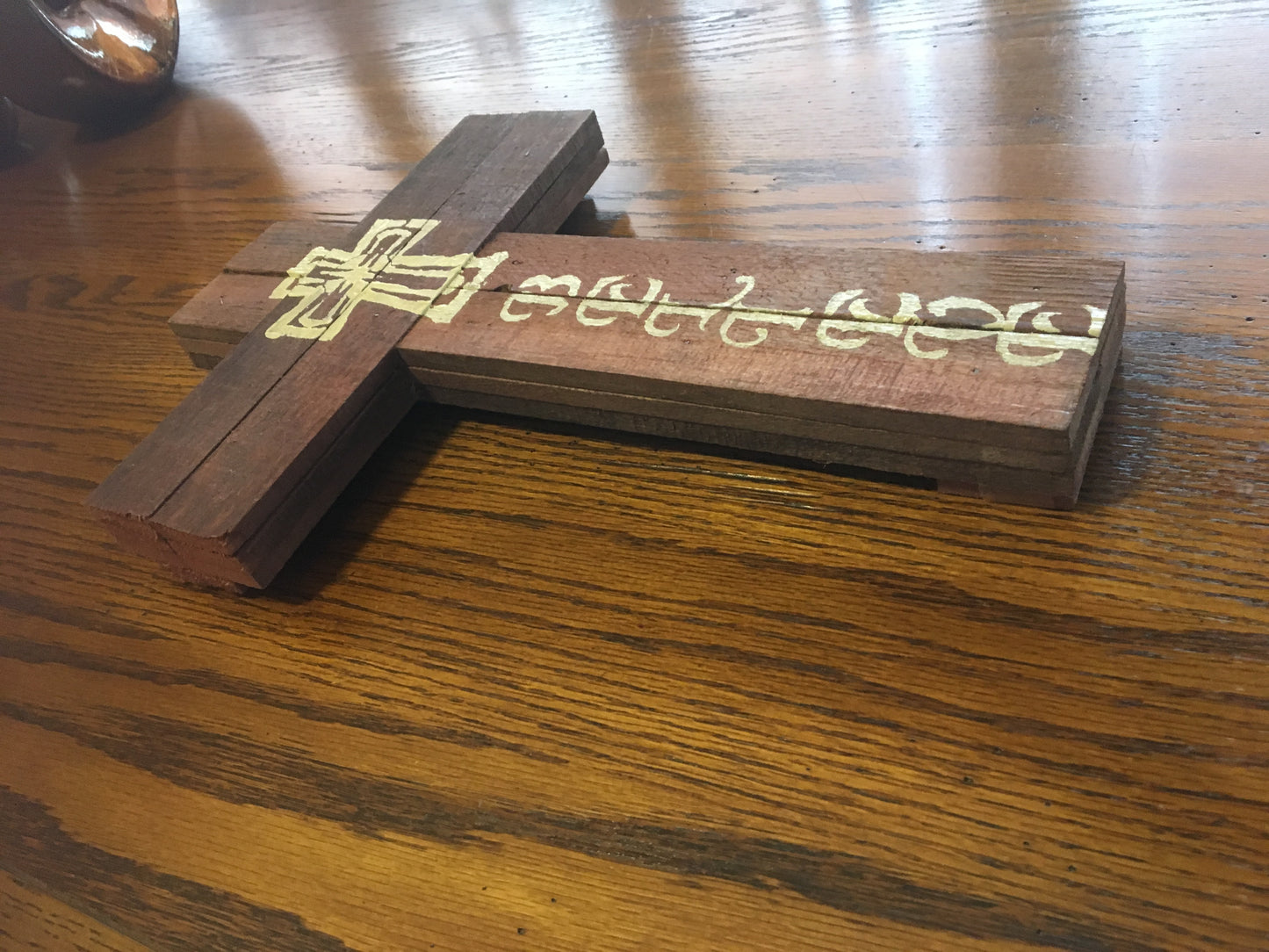 Believe wood sign on table