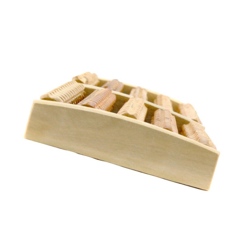 side view of wood foot massager