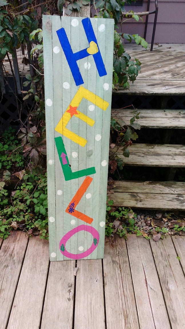 Hello wood sign outside