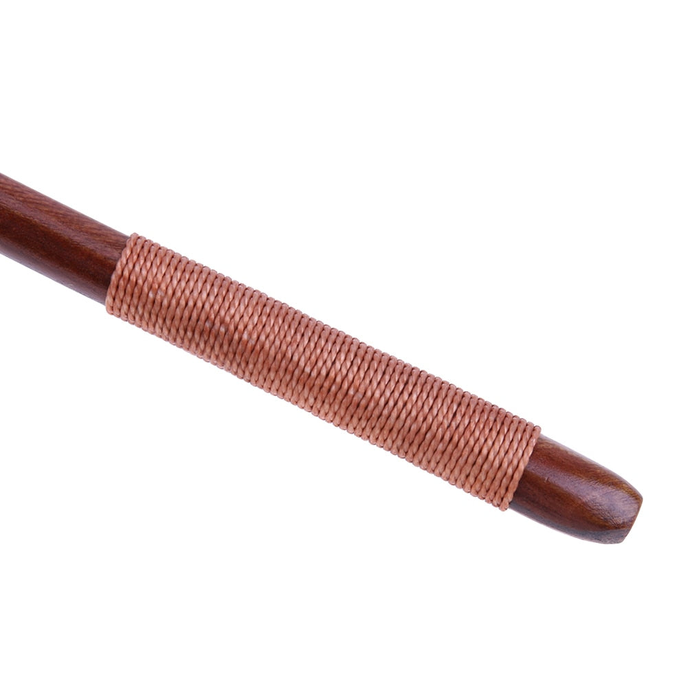 Long handled wood spoon with grip close up