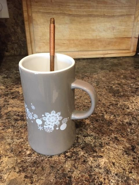 walnut stir spoon in deep mug
