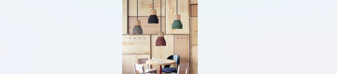 wood and cement droplights over kitchen table