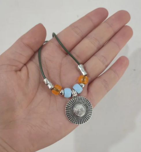 showing size of aztec necklace