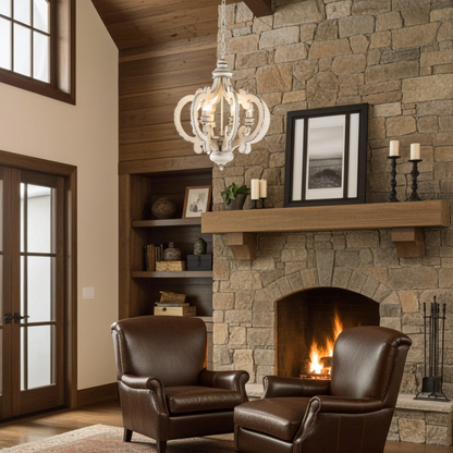 Distressed chandelier hanging in den over chairs