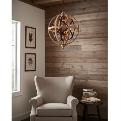 Cozy room with a beige armchair, wooden wall paneling, and a spherical chandelier.