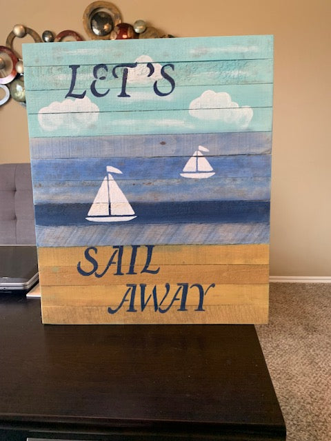 Sail Away sign sitting desk