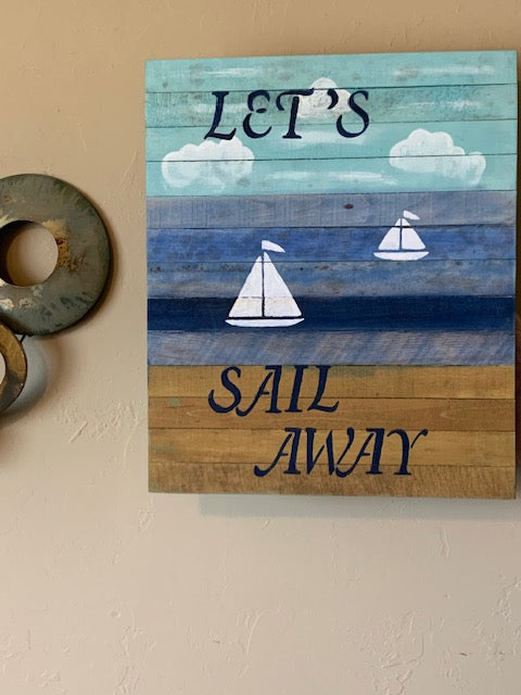 Sail Away sign on wall
