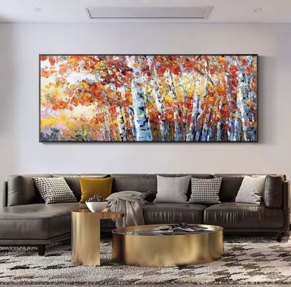 Colorful abstract painting of september on a wall above a sofa in a living room.