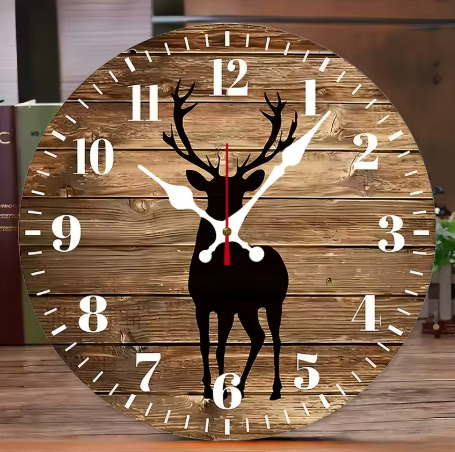 Wooden clock with deer design on a wooden surface