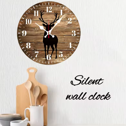 Wooden wall clock with deer design on a white wall, labeled 'Silent wall clock'.
