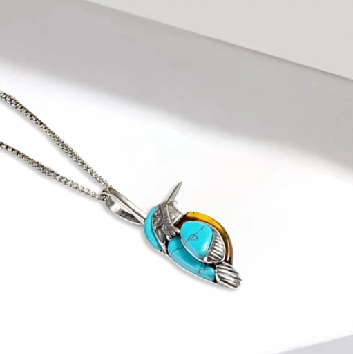 bird necklace on side