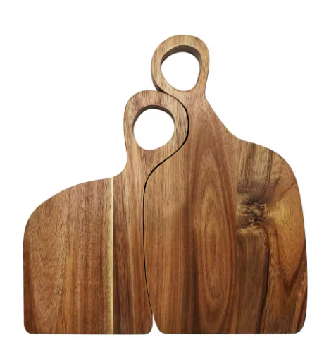 Two wooden cutting boards with handles on a white background