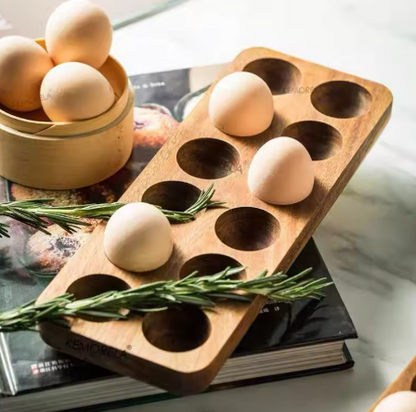 Wooden egg holder with eggs on a magazine