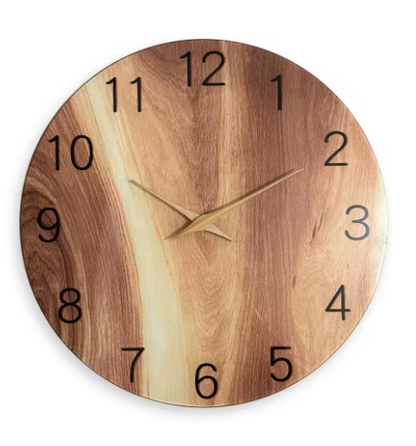 Wooden wall clock with a natural grain pattern on a white background