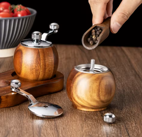 filling a wooden spice grinder
