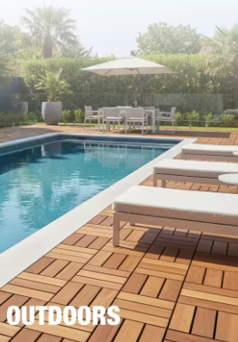 Tiled pool area with wooden deck, lounge chairs, and outdoor furniture.