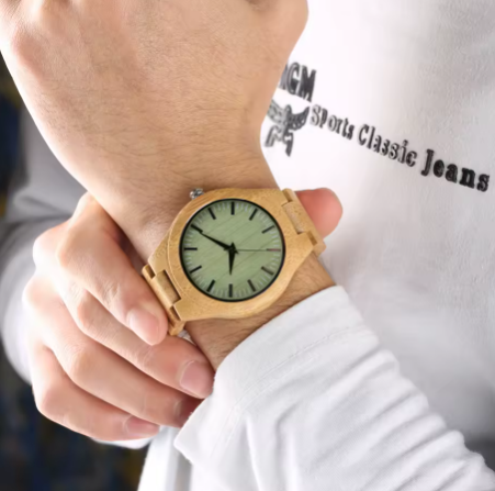 Wooden watch on a man's wrist 