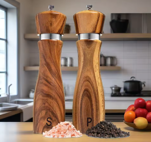 Wooden salt and pepper shakers with 'S' and 'P' on a kitchen counter.