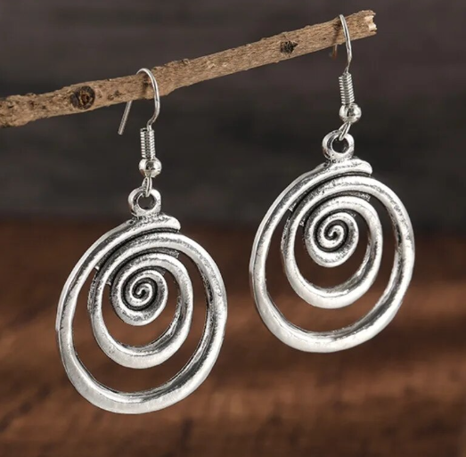 swirly earrings hanging