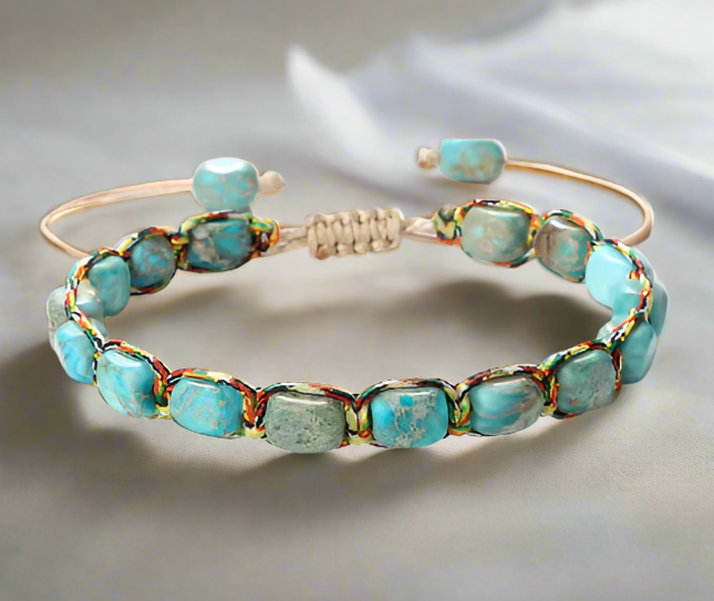 Turquoise beaded bracelet on a light background