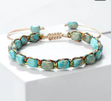 Turquoise beaded bracelet on a white background