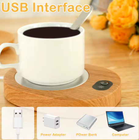 USB-heated mug pad with a white mug of coffee on a wooden surface, surrounded by decorative elements.