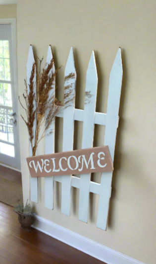 welcome sign on wall