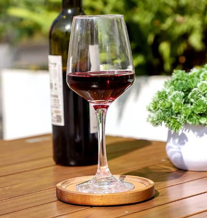 wine glass in wood coaster