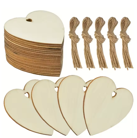 Set of wooden heart-shaped tags with jute twine on a white background