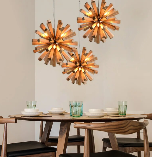 burst chandeliers over dining table