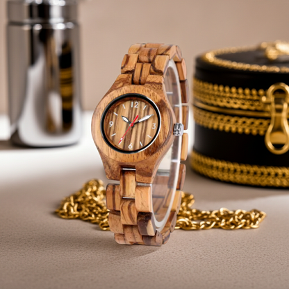 Wooden watch with a gold chain on a neutral background