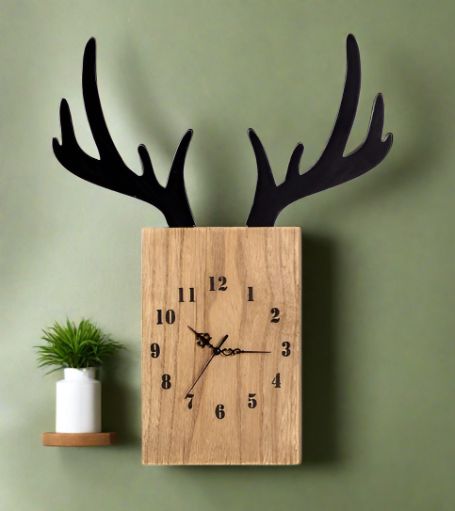 antler clock with plant