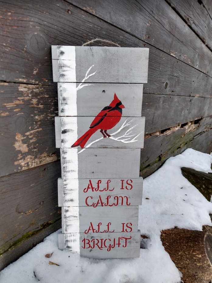 all is calm pallet sign near barn