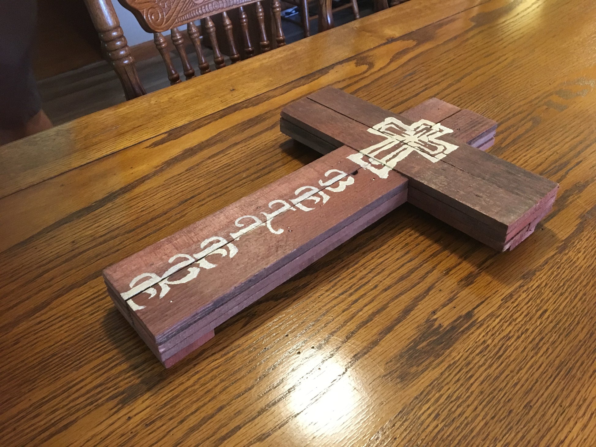 Believe pallet sign on pretty wood grain table