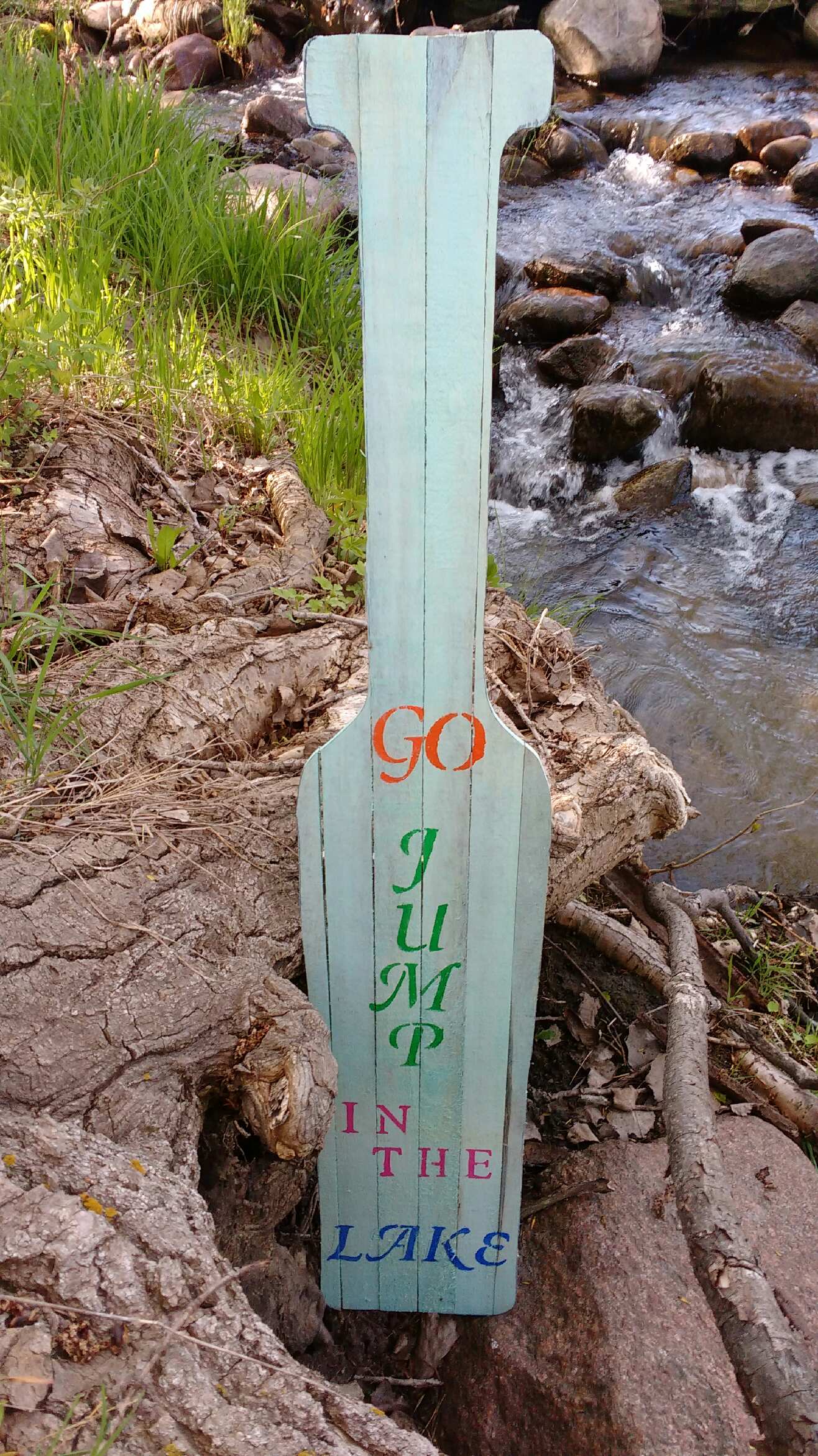 Go Jump in Lake pallet sign-by river