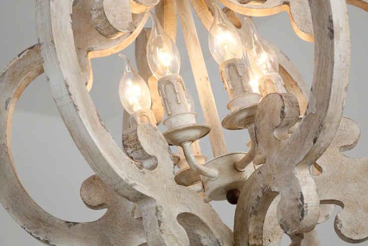 Victorian distressed wood chandelier-close up of lights