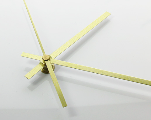 gold hands of autumn wall clock