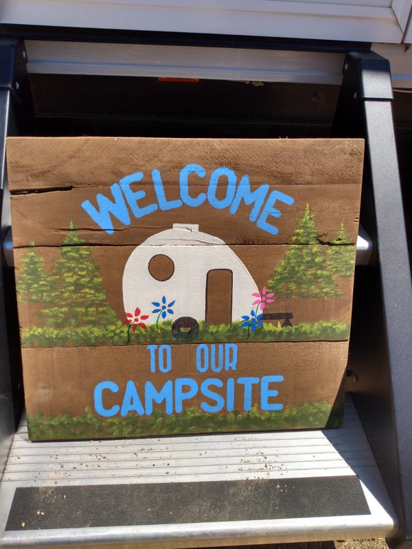 camping sign on RV stairs