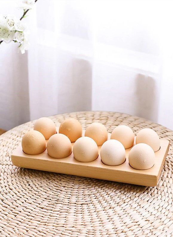 wooden egg holder with eggs