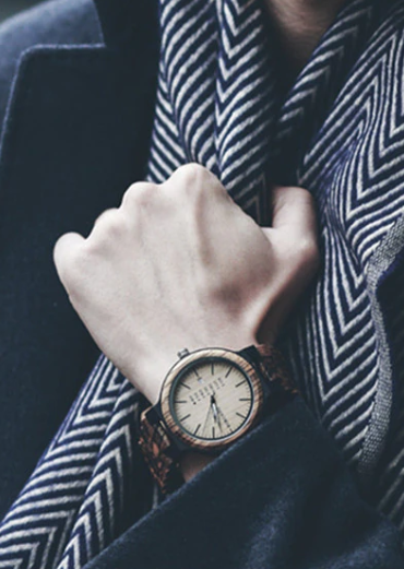man wearing wood wristwatch