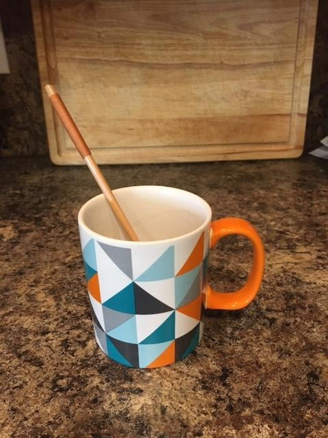 wood stir spoon in short mug
