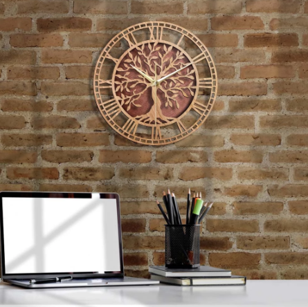 tree of life clock hanging on brick wall