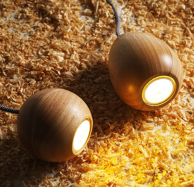 wood cased lights on wood chips-lit up