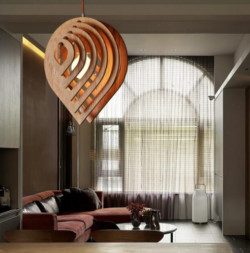 wood pendant light hanging in LR