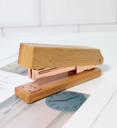 wood stapler with rose gold mechanics